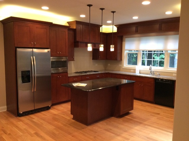 17 P Ashe Road Sugar Grove, IL 60554 - Photo 4 of 17 a kitchen with stainless steel appliances granite countertop a refrigerator a sink and a stove