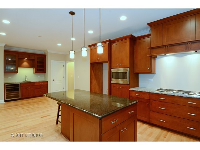 17 P Ashe Road Sugar Grove, IL 60554 - Photo 6 of 17 a kitchen with a sink cabinets and window