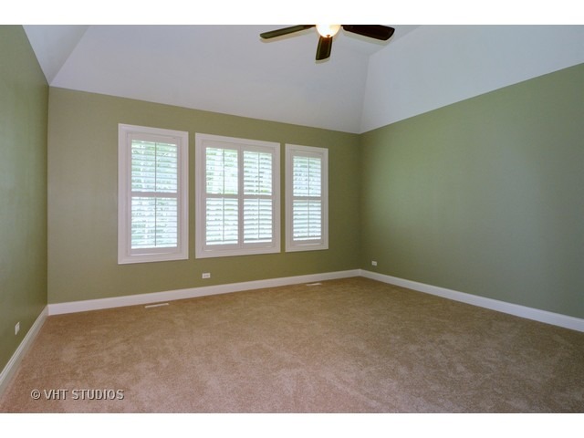 17 P Ashe Road Sugar Grove, IL 60554 - Photo 9 of 17 a view of an empty room with a window