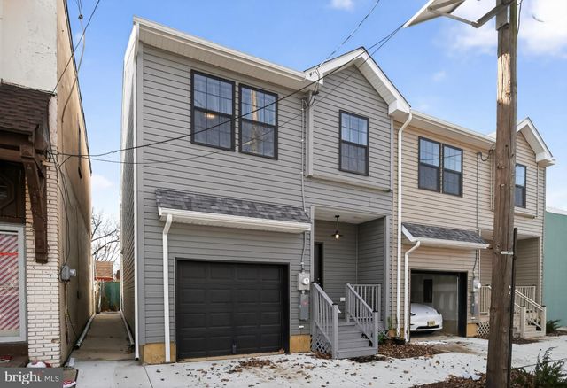a car parked in front of a building