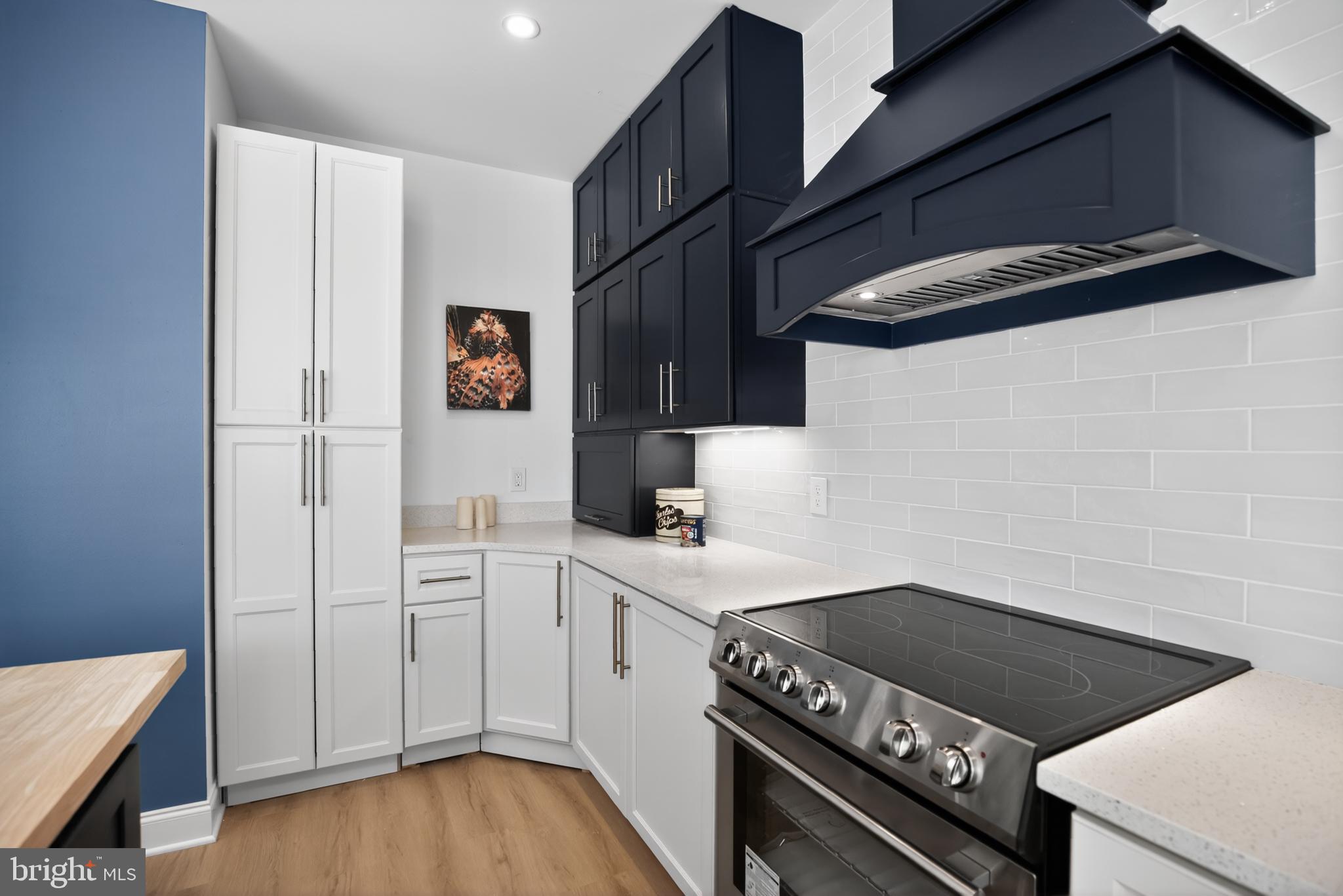 508 Richey Avenue Collingswood, NJ 08107 - Photo 12 of 40 a kitchen with a stove and a microwave