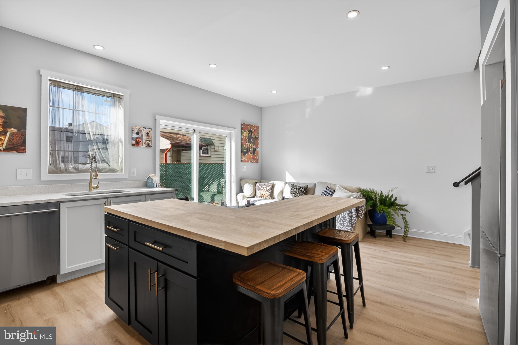 508 Richey Avenue Collingswood, NJ 08107 - Photo 14 of 40 a room with a table chairs and wooden floor