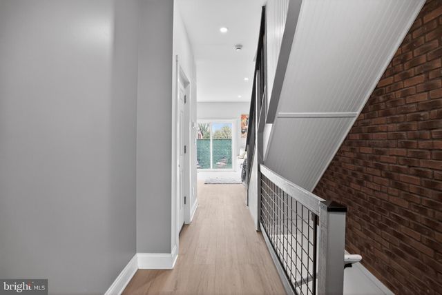 a utility room with a sink and a vanity