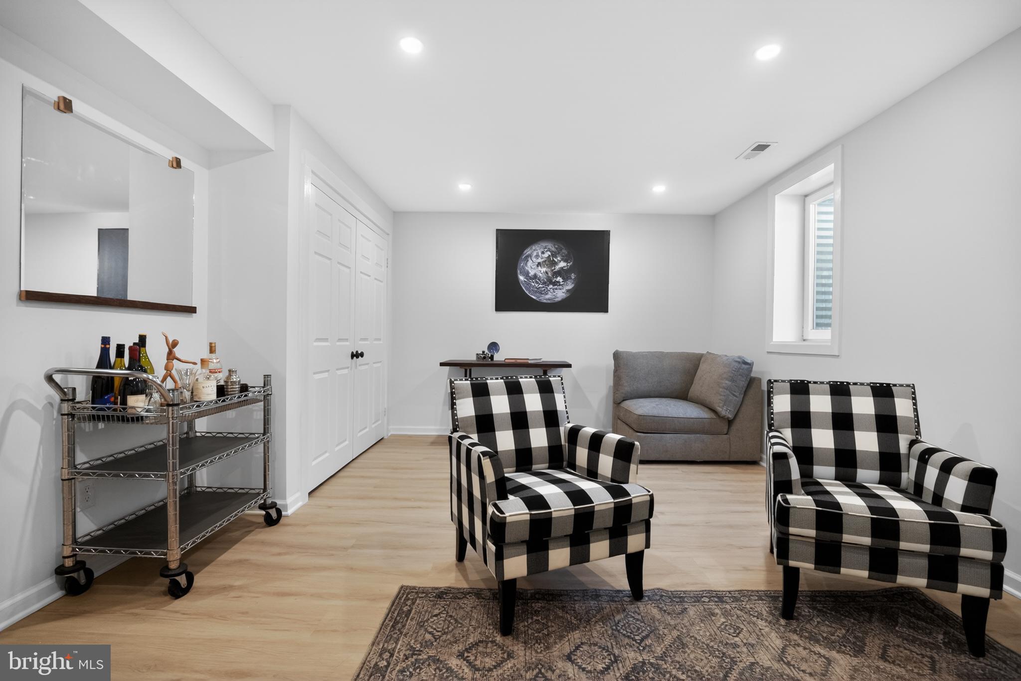 508 Richey Avenue Collingswood, NJ 08107 - Photo 20 of 40 a living room with furniture wooden floor and a flat screen tv