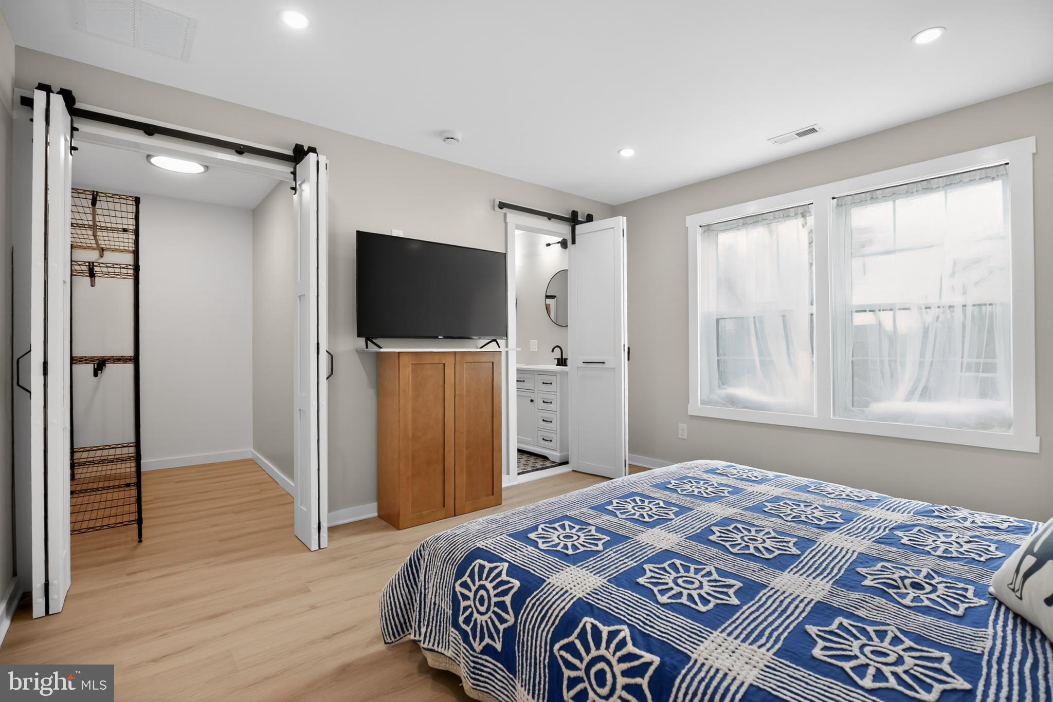 508 Richey Avenue Collingswood, NJ 08107 - Photo 25 of 40 a bedroom with a bed and a flat screen tv