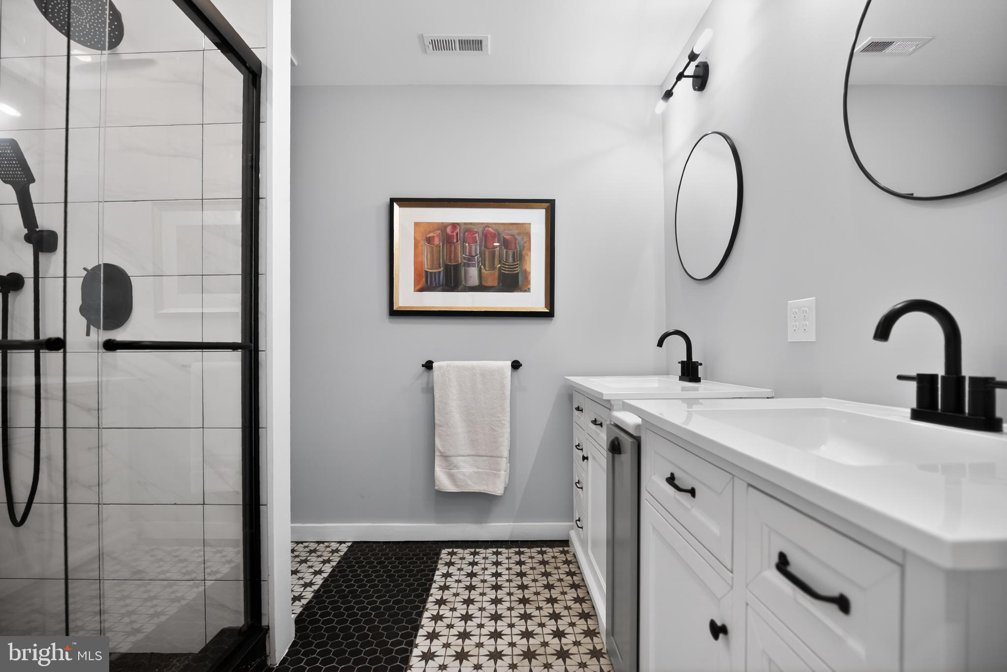 508 Richey Avenue Collingswood, NJ 08107 - Photo 26 of 40 a bathroom with a sink and a mirror