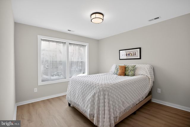 a bathroom with a shower and a tub