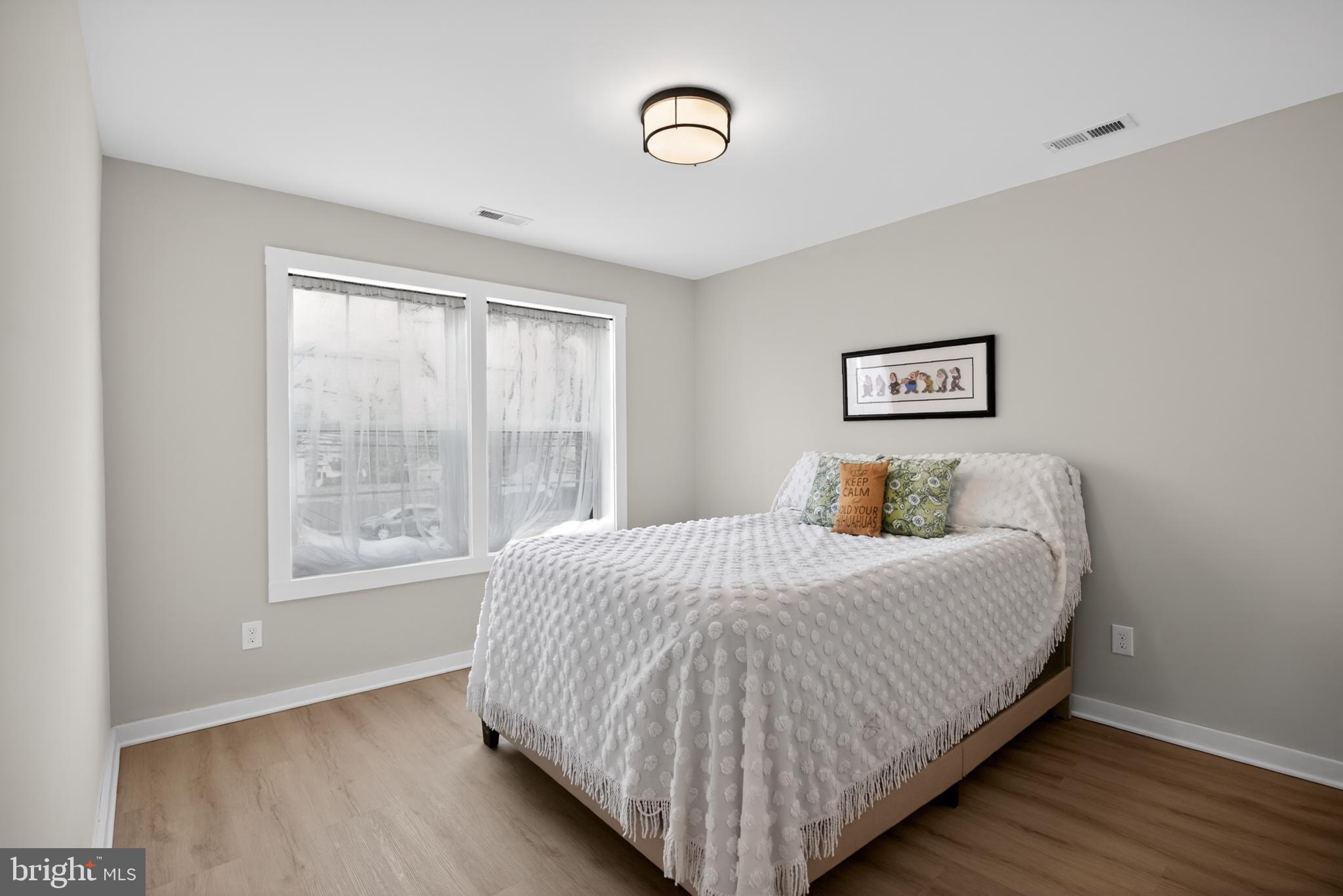 508 Richey Avenue Collingswood, NJ 08107 - Photo 30 of 40 a bedroom with a bed and a window