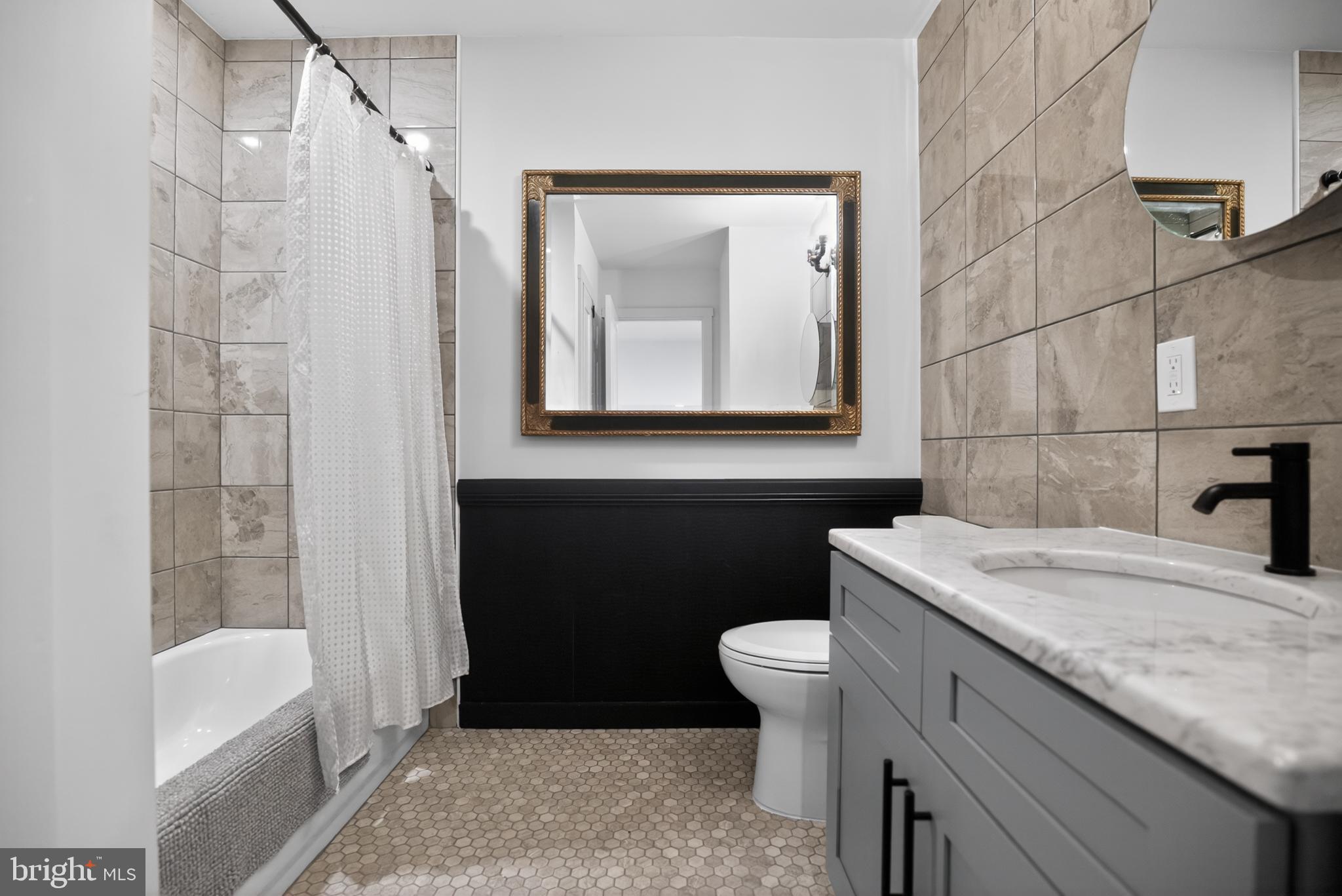 508 Richey Avenue Collingswood, NJ 08107 - Photo 31 of 40 a bathroom with a granite countertop sink toilet and shower