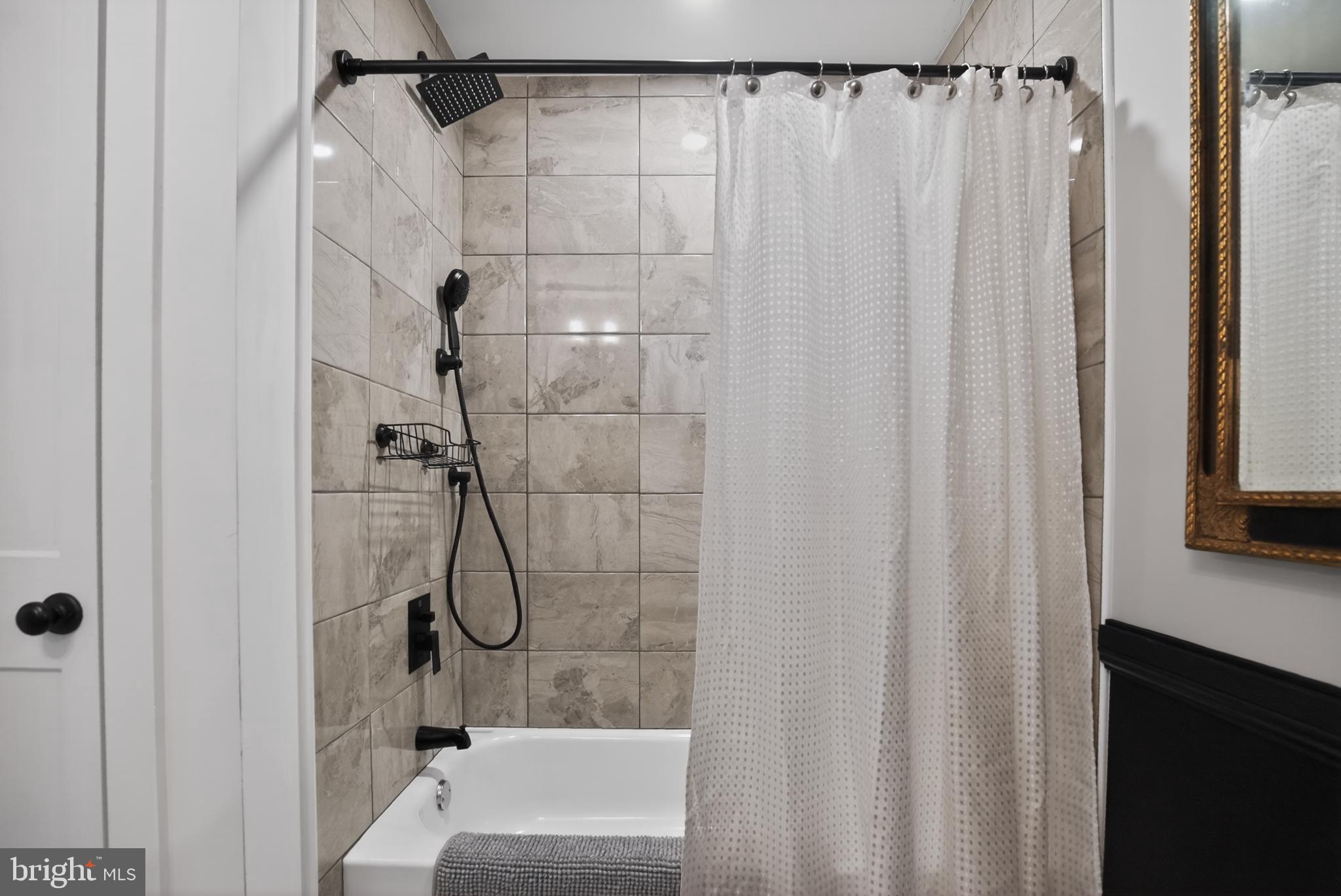 508 Richey Avenue Collingswood, NJ 08107 - Photo 32 of 40 a bathroom with a shower and a tub