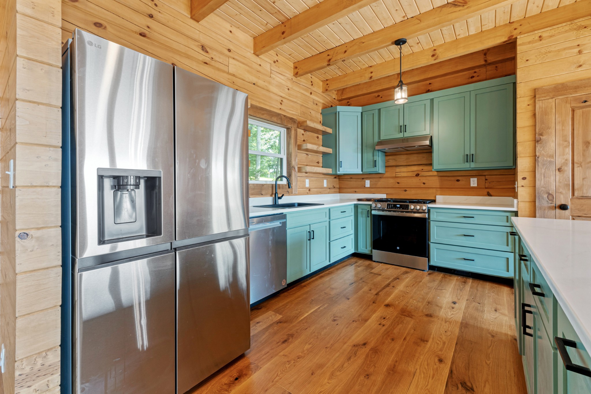 2367 Eagle Rock Road Monteagle, TN 37356 - Photo 12 of 63 a kitchen with stainless steel appliances granite countertop a refrigerator a sink and a stove