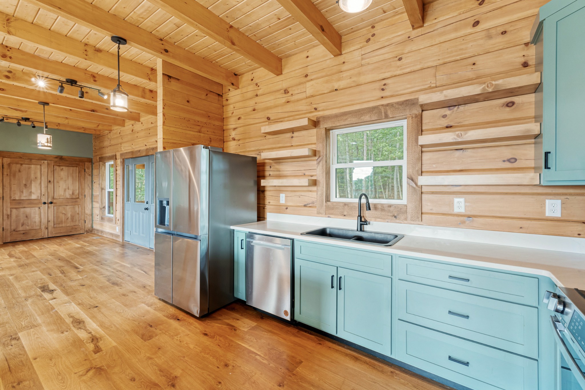 2367 Eagle Rock Road Monteagle, TN 37356 - Photo 16 of 63 a kitchen with stainless steel appliances a sink cabinets and a window