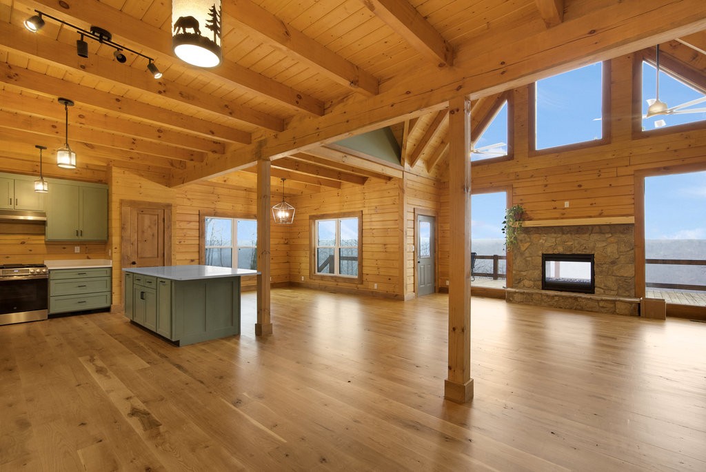 2367 Eagle Rock Road Monteagle, TN 37356 - Photo 2 of 63 a view of a patio with table and chairs with wooden floor
