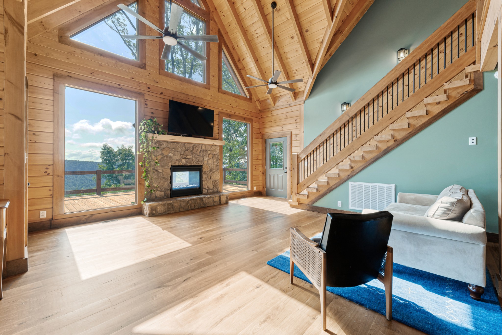 2367 Eagle Rock Road Monteagle, TN 37356 - Photo 21 of 63 a living room with furniture and a fireplace