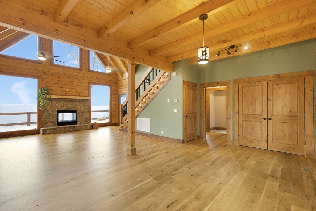 2367 Eagle Rock Road Monteagle, TN 37356 - Photo 22 of 63 a view of a livingroom with wooden floor and a fireplace