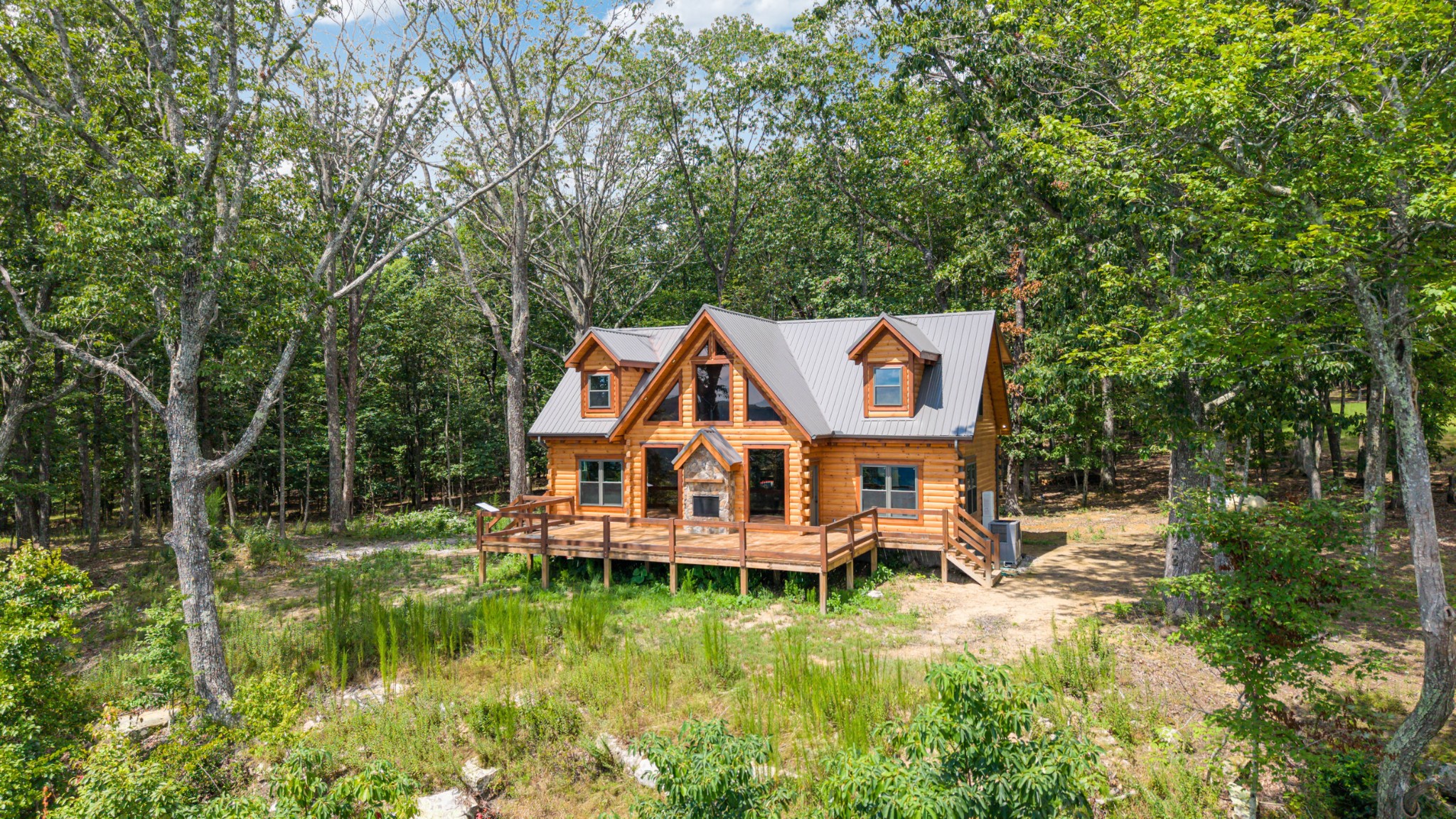 2367 Eagle Rock Road Monteagle, TN 37356 - Photo 3 of 63 an aerial view of a house with a big yard and large trees