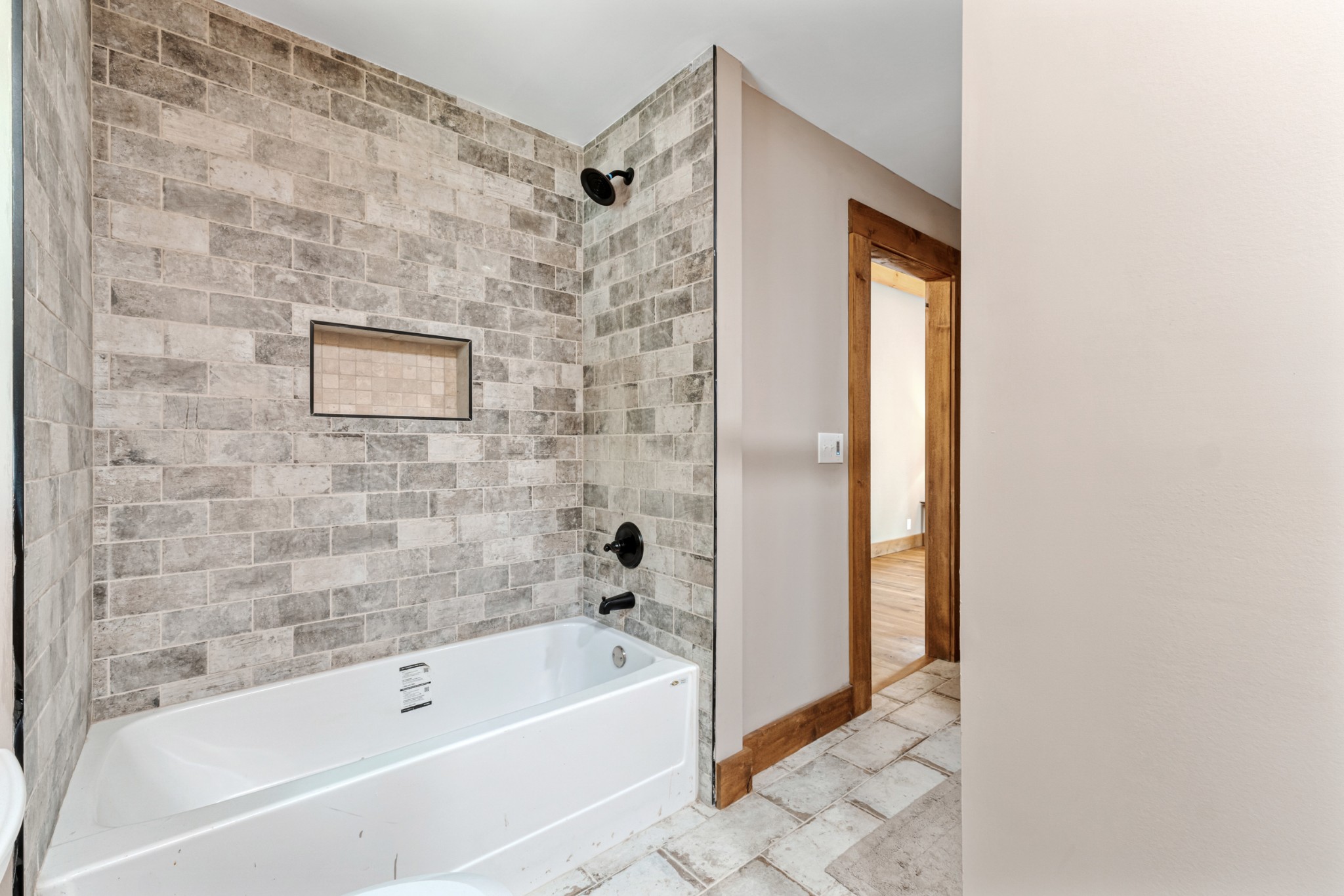 2367 Eagle Rock Road Monteagle, TN 37356 - Photo 35 of 63 a bathroom with a bathtub and a shower