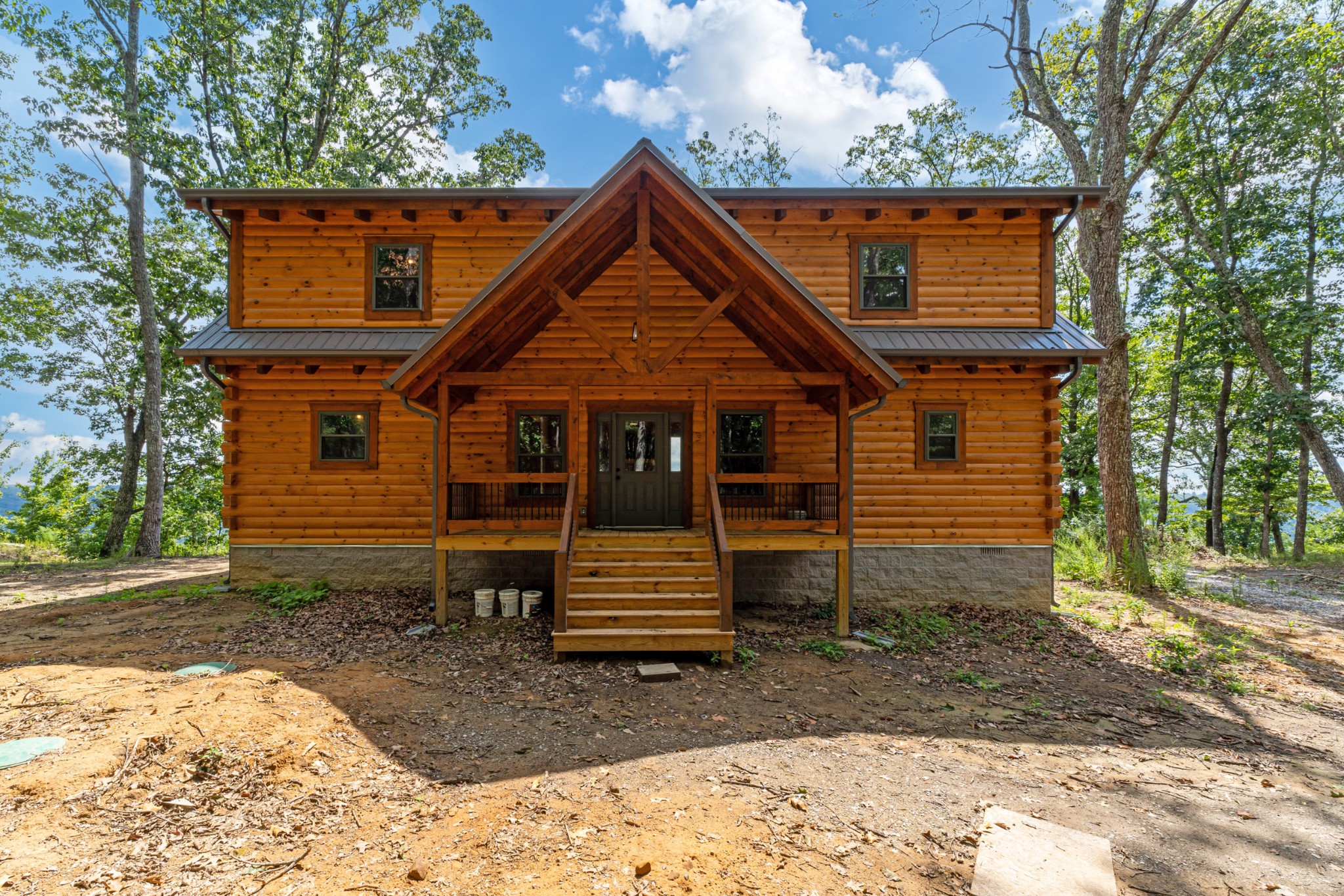 2367 Eagle Rock Road Monteagle, TN 37356 - Photo 4 of 63 a front view of a house with a yard