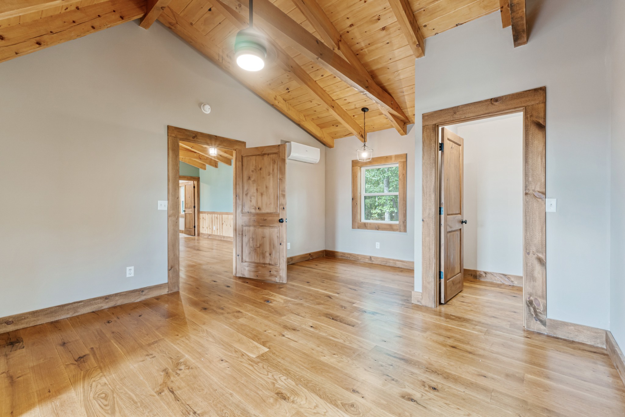 2367 Eagle Rock Road Monteagle, TN 37356 - Photo 44 of 63 a view of an empty room with window and wooden floor