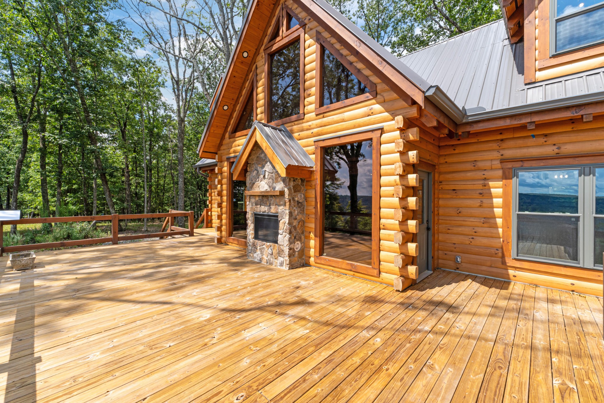 2367 Eagle Rock Road Monteagle, TN 37356 - Photo 47 of 63 a view of a house with a barbeque and wooden stairs
