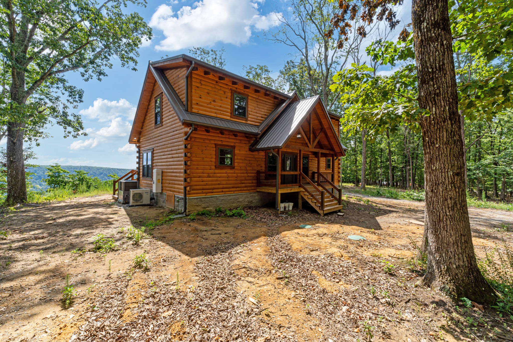2367 Eagle Rock Road Monteagle, TN 37356 - Photo 5 of 63 a view of a house with backyard and a tree