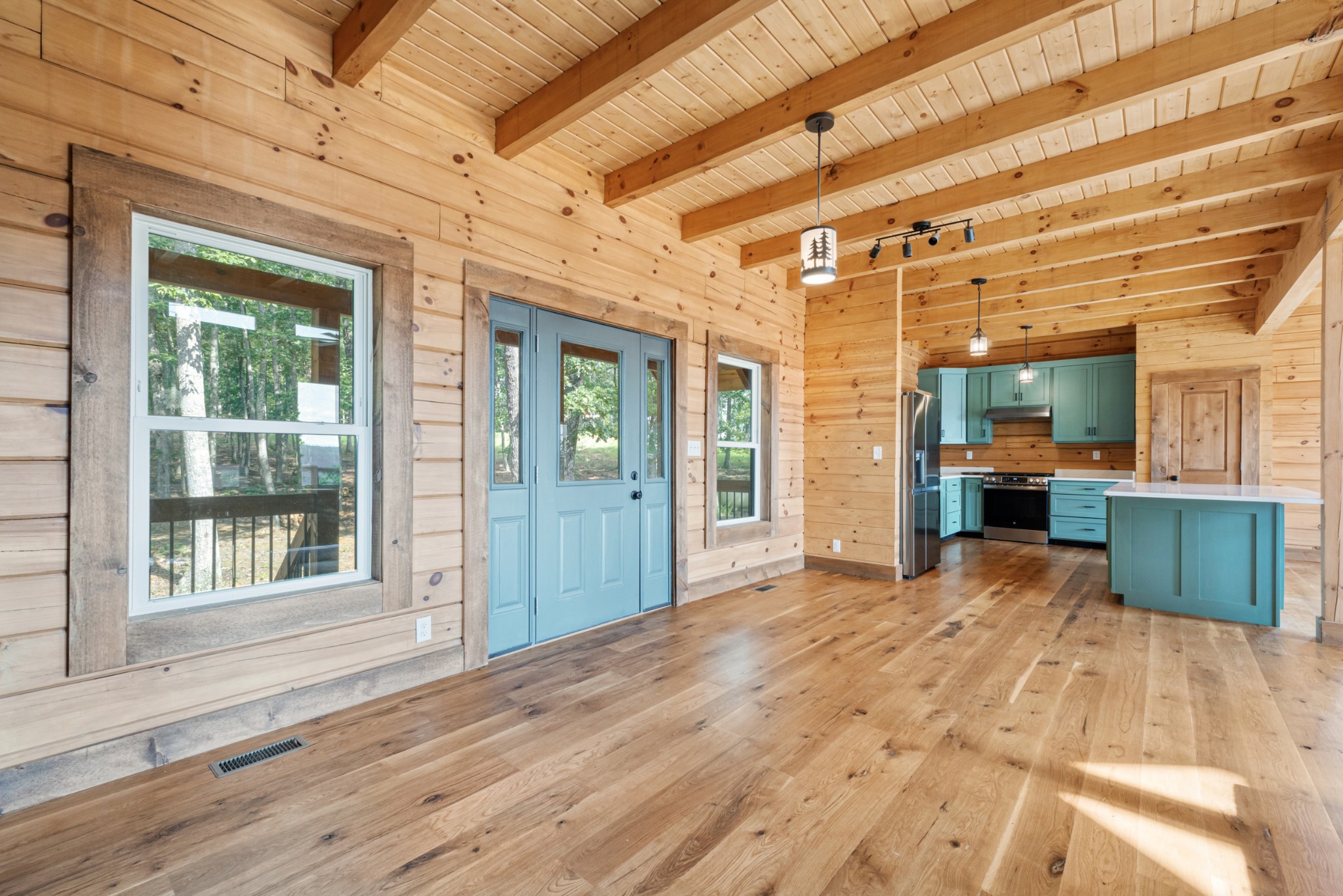 2367 Eagle Rock Road Monteagle, TN 37356 - Photo 9 of 63 a view of a room with wooden floor and a window