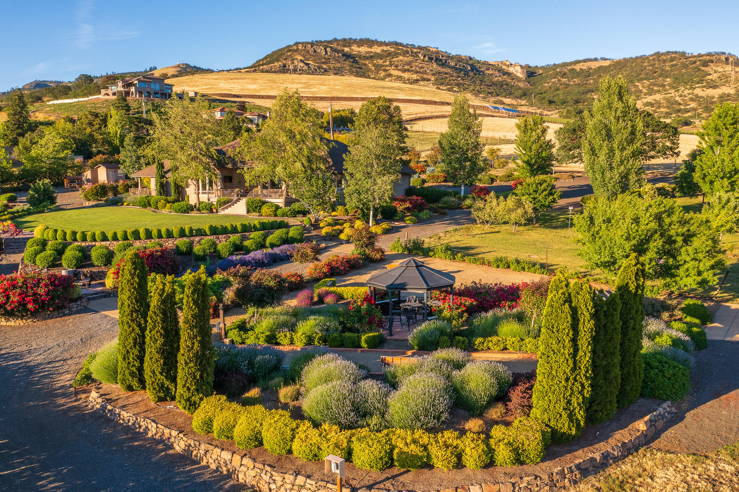 5709 Hughes Road Medford, OR 97504 - Photo 45 of 70 a view of a swimming pool with an outdoor seating