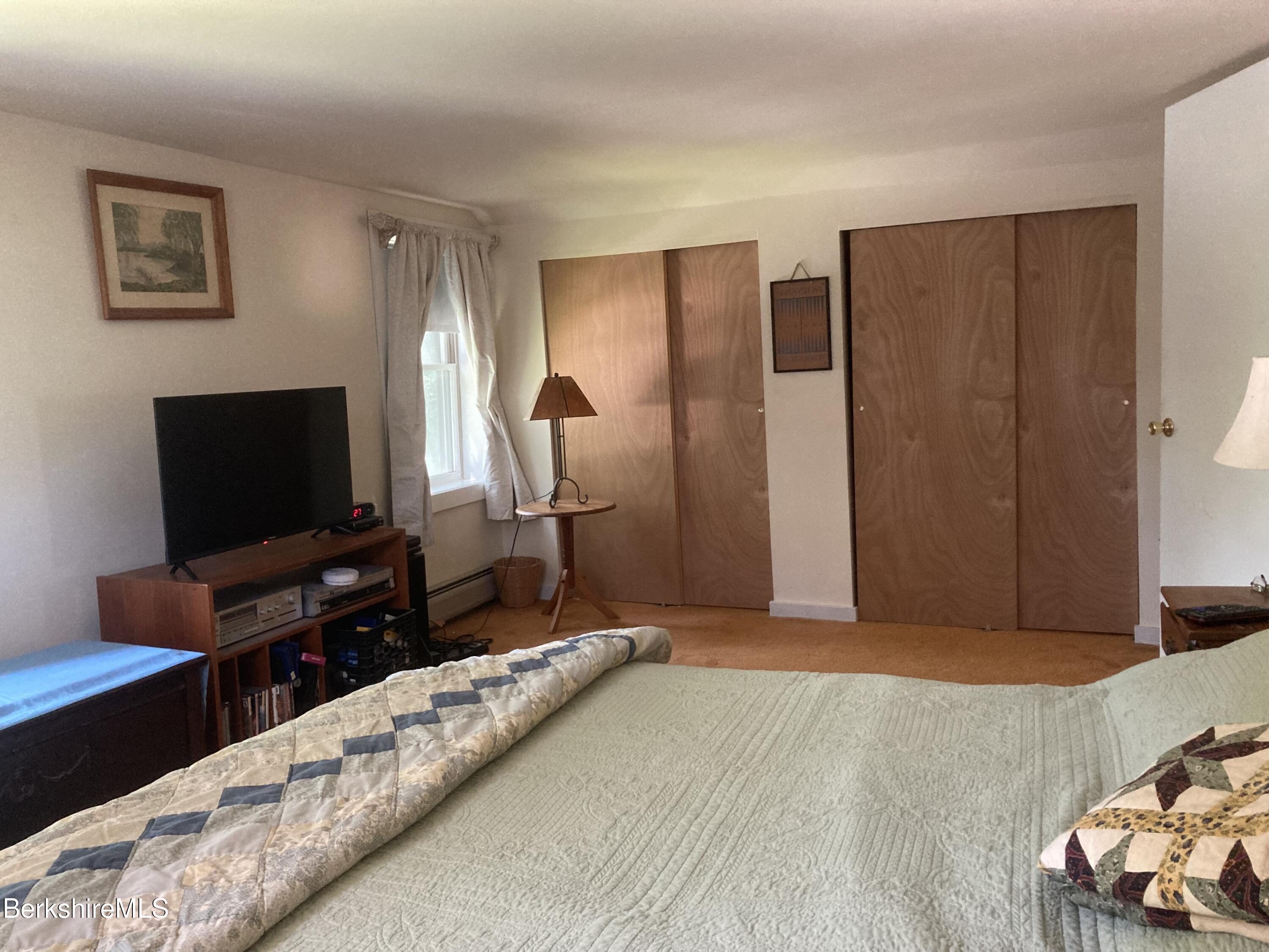 14 Blotz Road Washington, MA 01223 - Photo 14 of 28 a living room with furniture and a flat screen tv