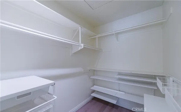 a view of an empty walk in closet