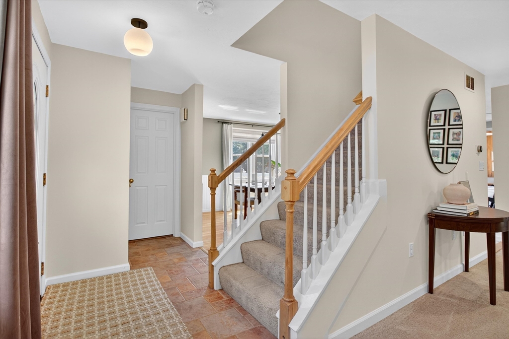 34 Timberline Road Millis, MA 02054 - Photo 2 of 42 a view of front door with stairs