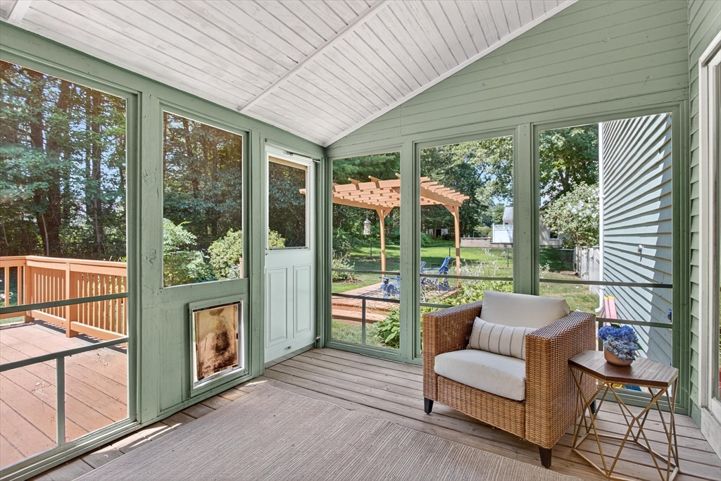 34 Timberline Road Millis, MA 02054 - Photo 27 of 42 a balcony with furniture and large windows