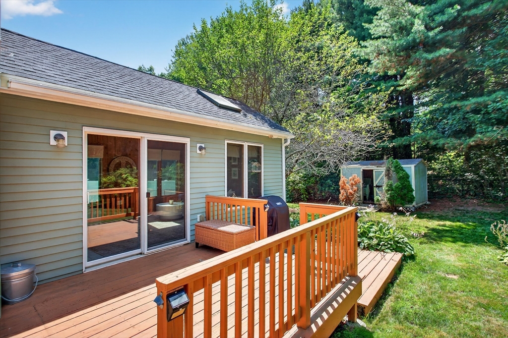 34 Timberline Road Millis, MA 02054 - Photo 31 of 42 a view of house with a deck and furniture