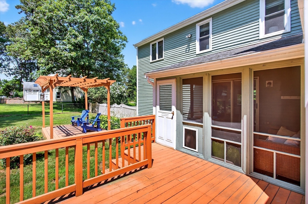 34 Timberline Road Millis, MA 02054 - Photo 32 of 42 a view of a house with a deck