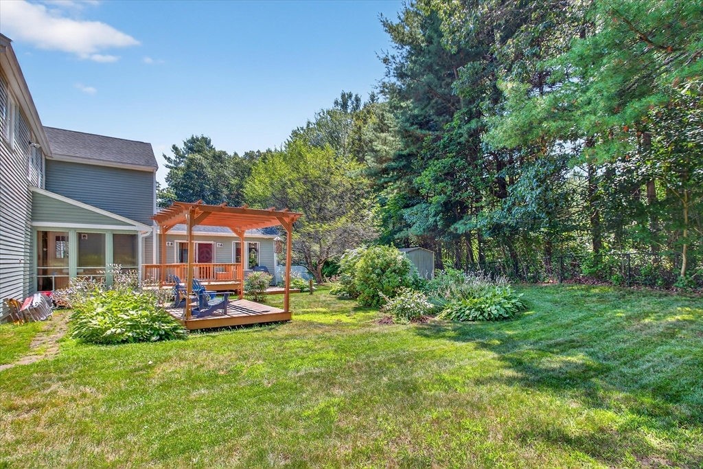 34 Timberline Road Millis, MA 02054 - Photo 34 of 42 a front view of a house with garden