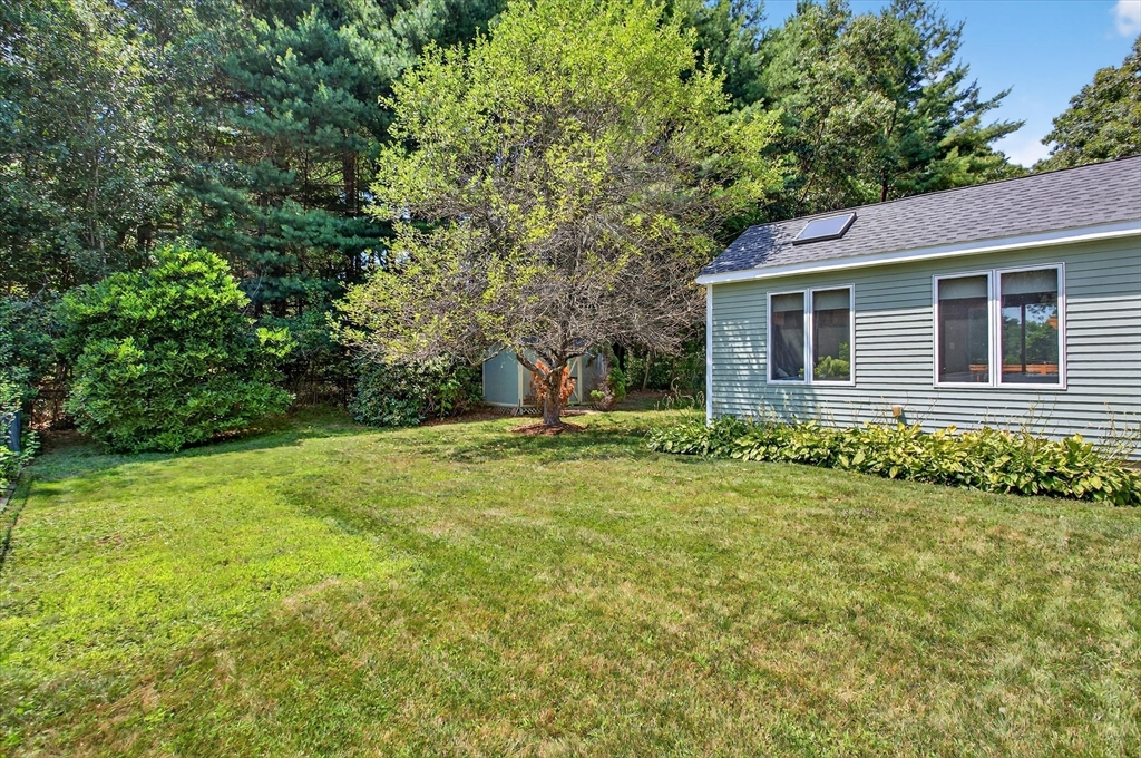 34 Timberline Road Millis, MA 02054 - Photo 37 of 42 a front view of a house with garden