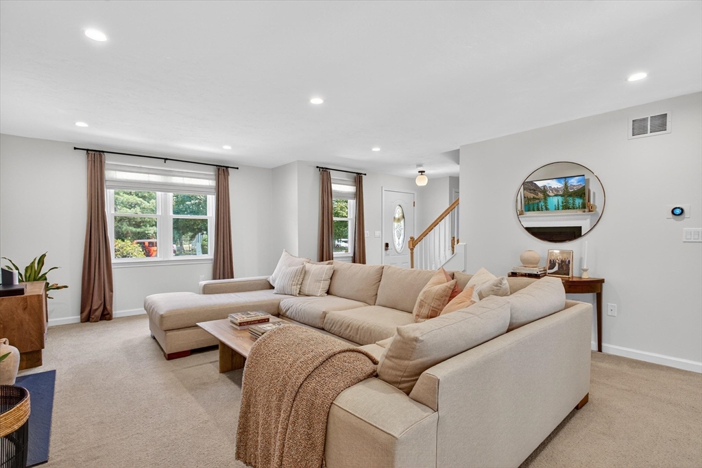 34 Timberline Road Millis, MA 02054 - Photo 4 of 42 a living room with furniture and a large window