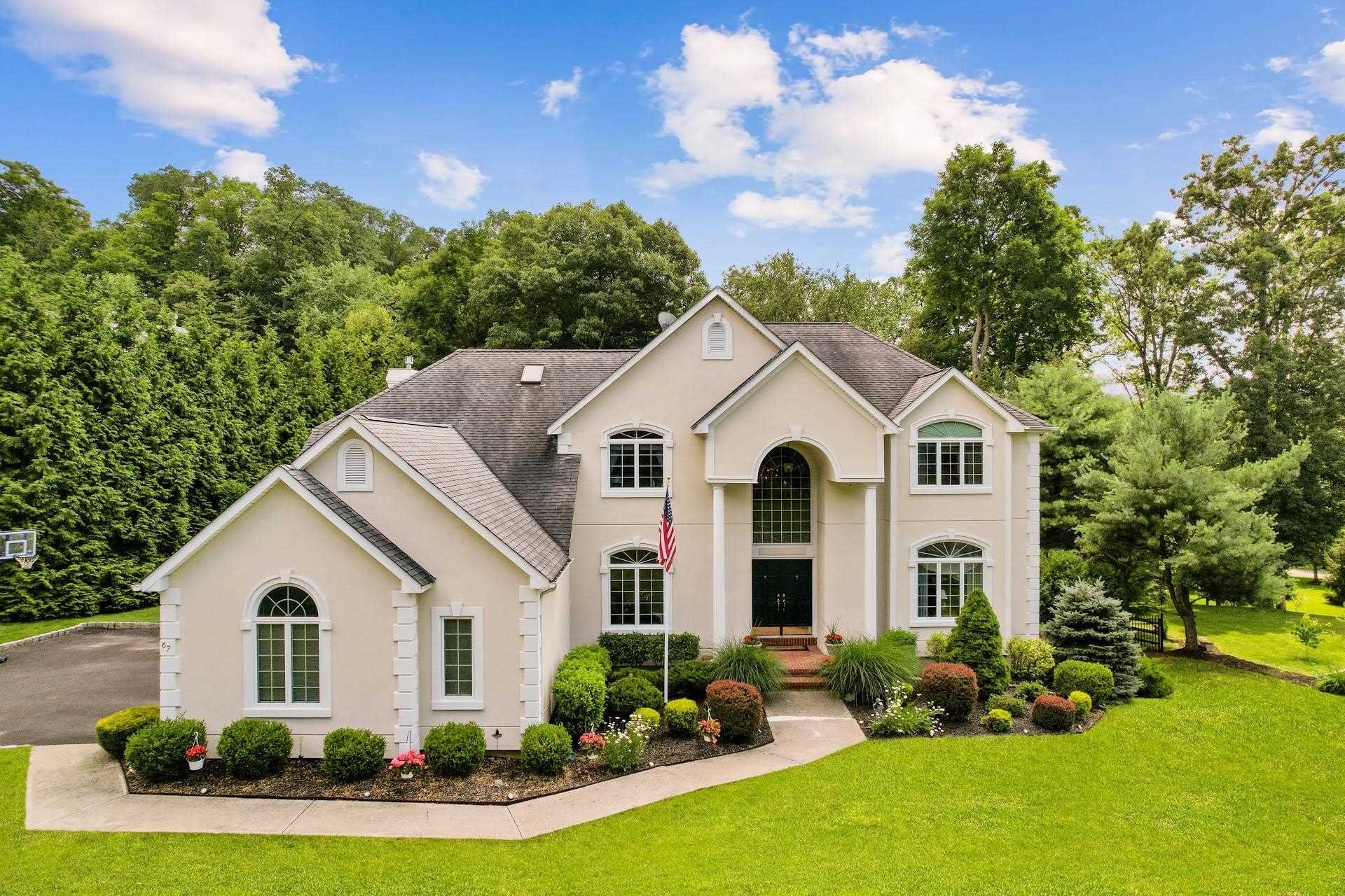 67 Greenwich Avenue Central Valley, NY 10917 - Photo 1 of 30 a view of a white house with a yard and potted plants