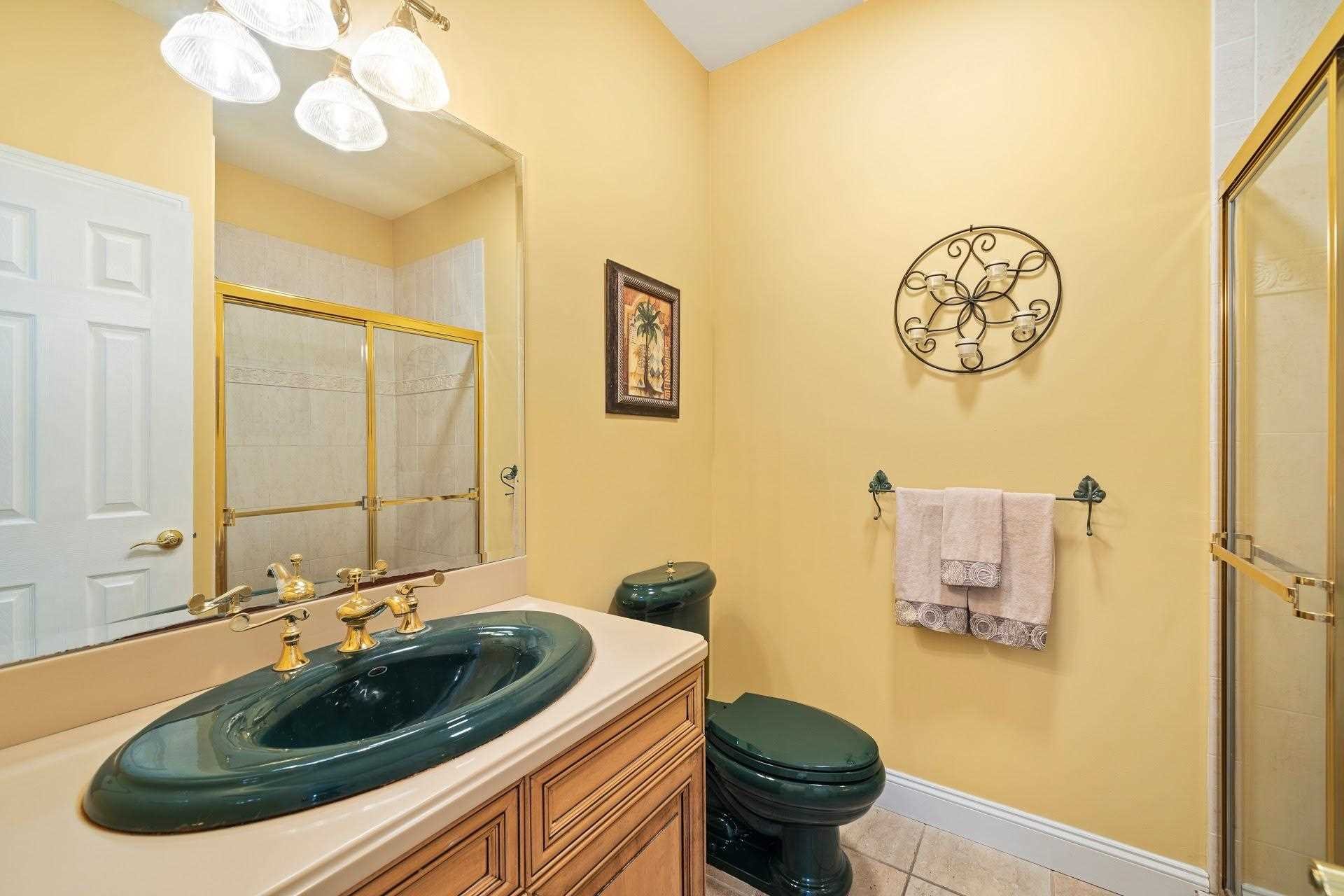 67 Greenwich Avenue Central Valley, NY 10917 - Photo 13 of 30 a bathroom with a sink and a mirror