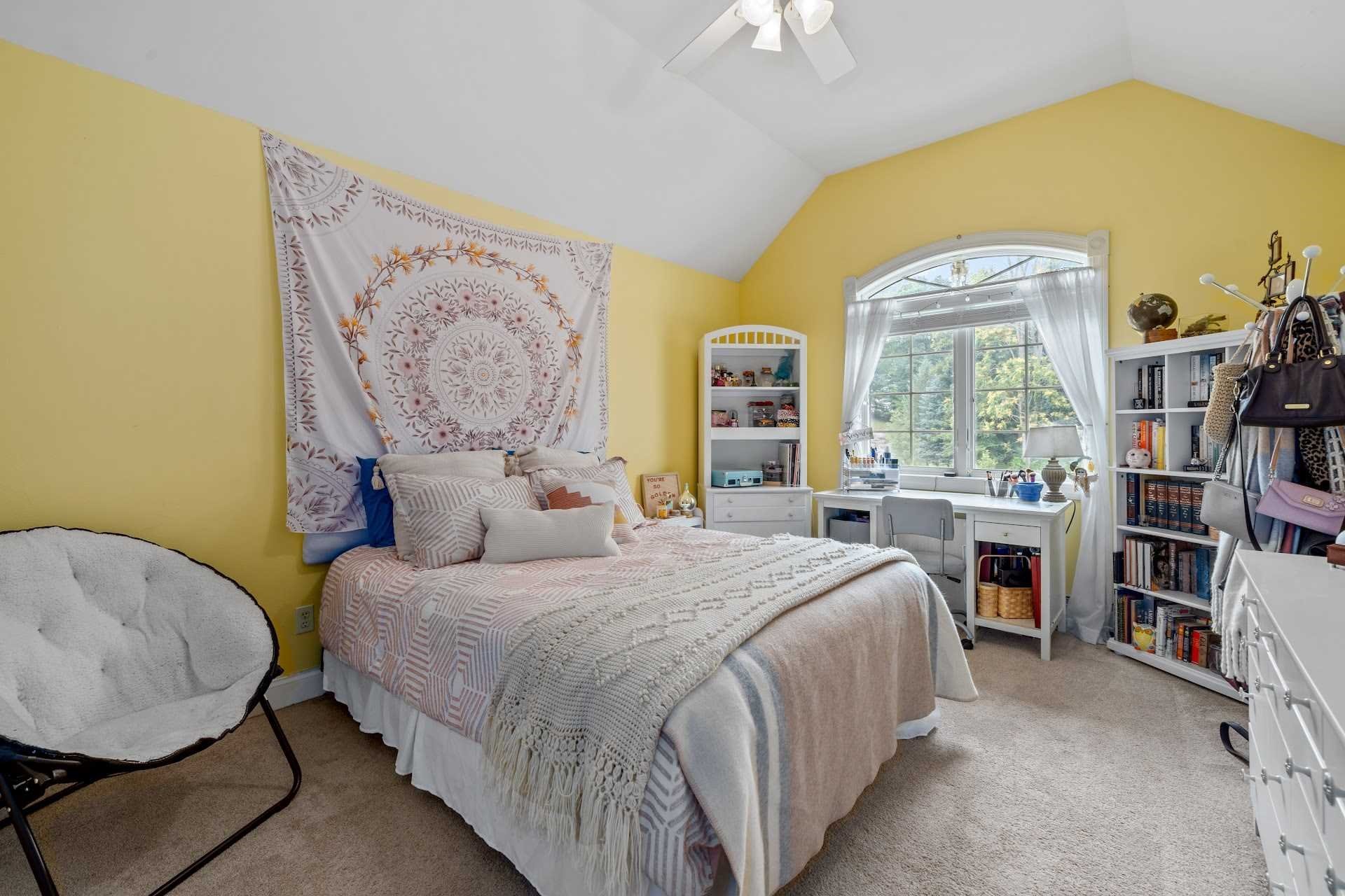 67 Greenwich Avenue Central Valley, NY 10917 - Photo 19 of 30 a bedroom with a bed and a book shelf