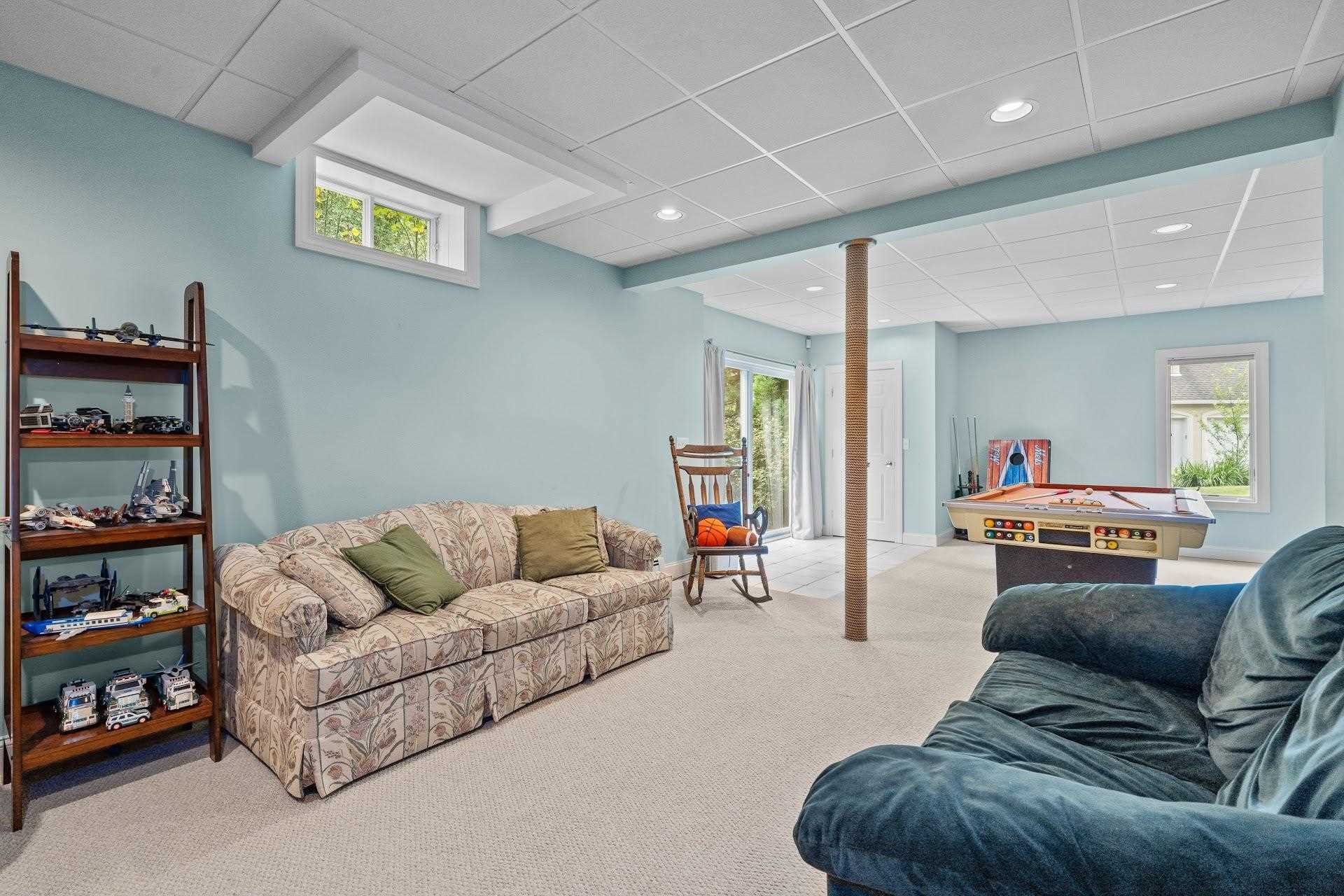 67 Greenwich Avenue Central Valley, NY 10917 - Photo 20 of 30 a living room with furniture and a window