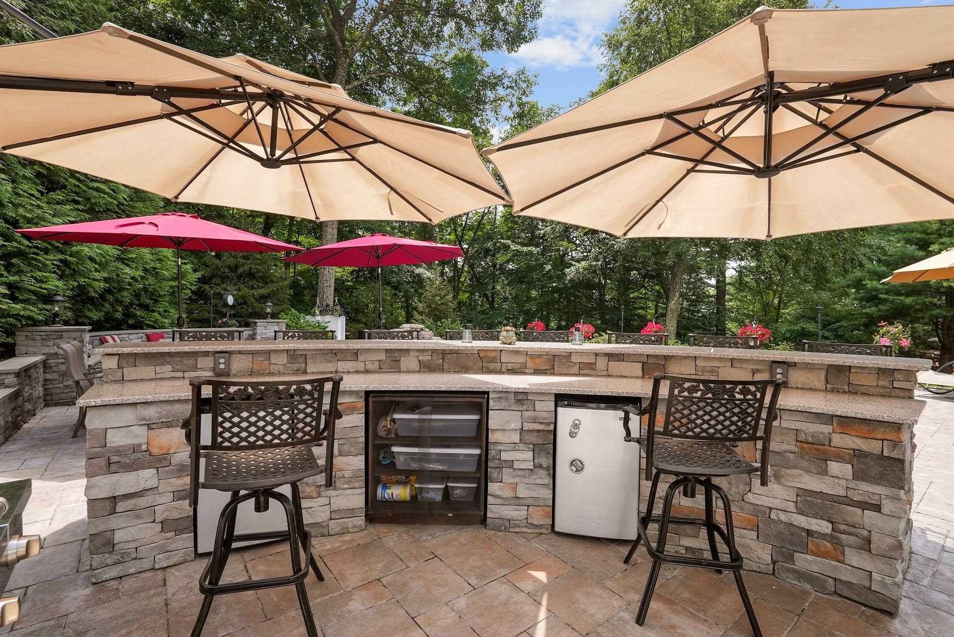 67 Greenwich Avenue Central Valley, NY 10917 - Photo 25 of 30 a patio with a patio table and chairs