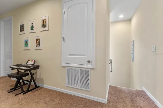 a view of a livingroom with furniture and a window
