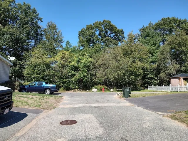 a picture of a bench in a white wall