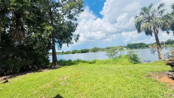 a view of swimming pool and lake