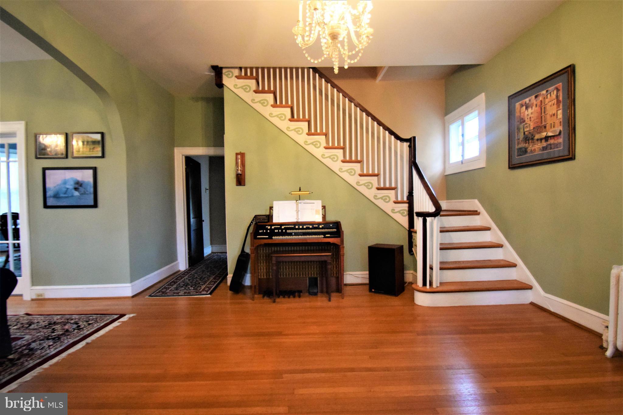 601 Charing Cross Road Baltimore, MD 21229 - Photo 3 of 30 a view of entryway and hall with wooden floor