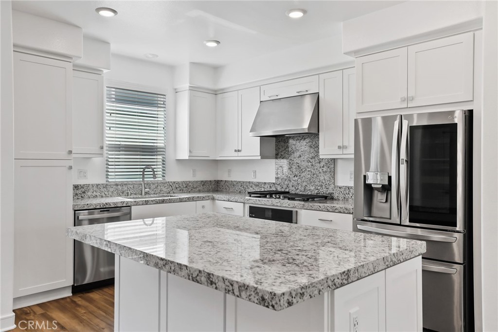 454 Palermo Lake Forest, CA 92630 - Photo 1 of 44 a kitchen with stainless steel appliances granite countertop a sink stove and refrigerator