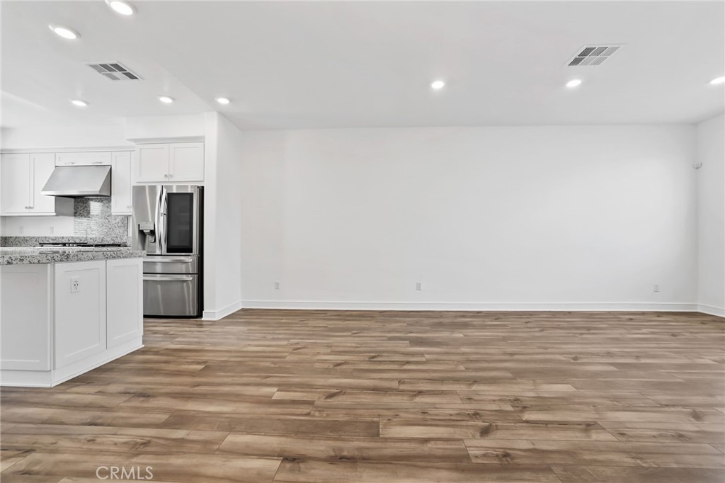 454 Palermo Lake Forest, CA 92630 - Photo 12 of 44 a view of kitchen with granite countertop cabinets and sink