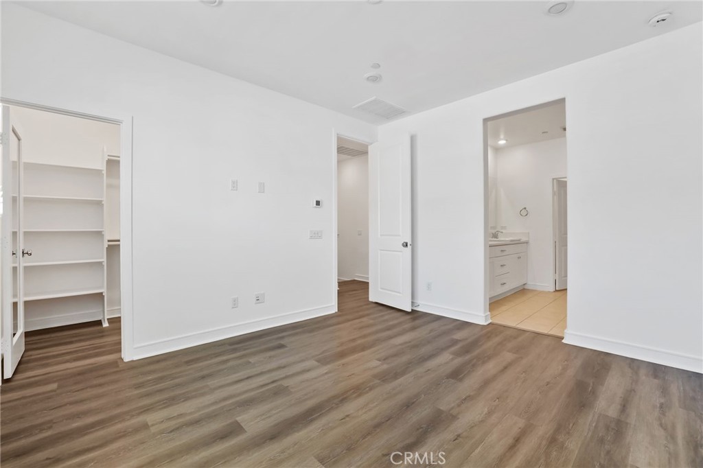 454 Palermo Lake Forest, CA 92630 - Photo 18 of 44 a view of an empty room with closet and a window