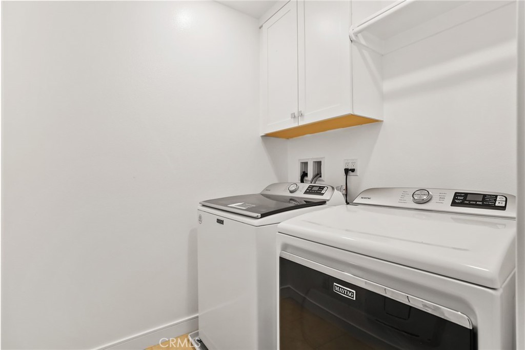 454 Palermo Lake Forest, CA 92630 - Photo 29 of 44 a utility room with dryer and washer
