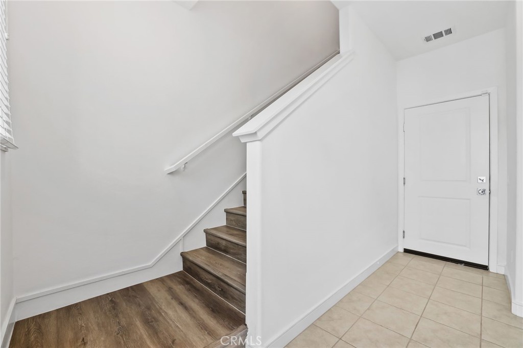 454 Palermo Lake Forest, CA 92630 - Photo 31 of 44 a view of entryway and hall with wooden floor